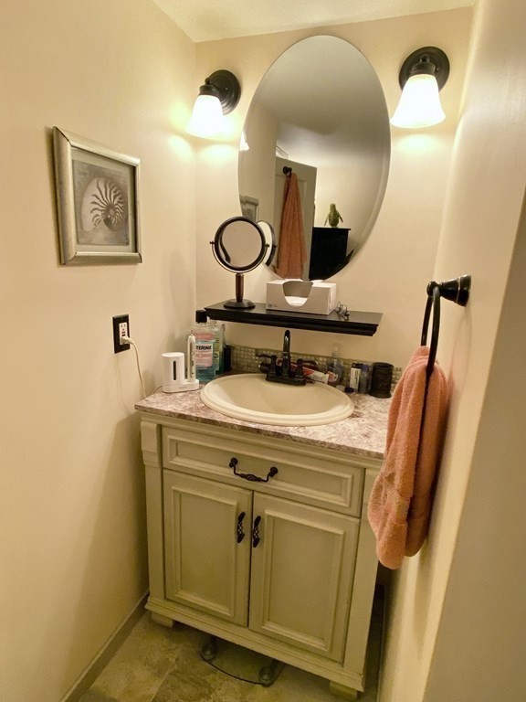 7 McGregory Road Sturbridge, MA 01566 - Photo 33 of 40 a room with a sink and a mirror