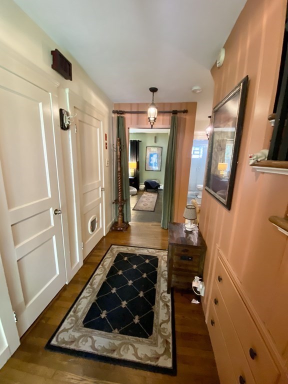 7 McGregory Road Sturbridge, MA 01566 - Photo 8 of 40 a room with wooden floor and furniture