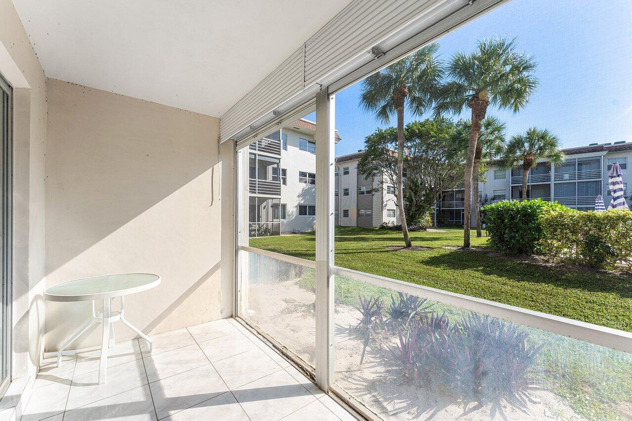 5701 Northwest 2nd Avenue Boca Raton, FL 33487 - Photo 21 of 26 a view of a house with a yard