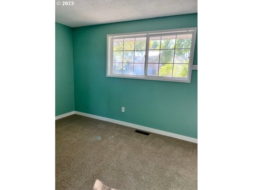 3331 Southwest Kirk Avenue Pendleton, OR 97801 - Photo 9 of 25 a view of a room that has a window in it
