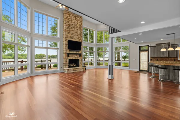a view of an livingroom with kitchen and furniture