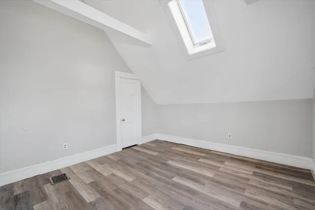 a view of a room that has a window