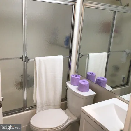 a bathroom with a sink and toilet