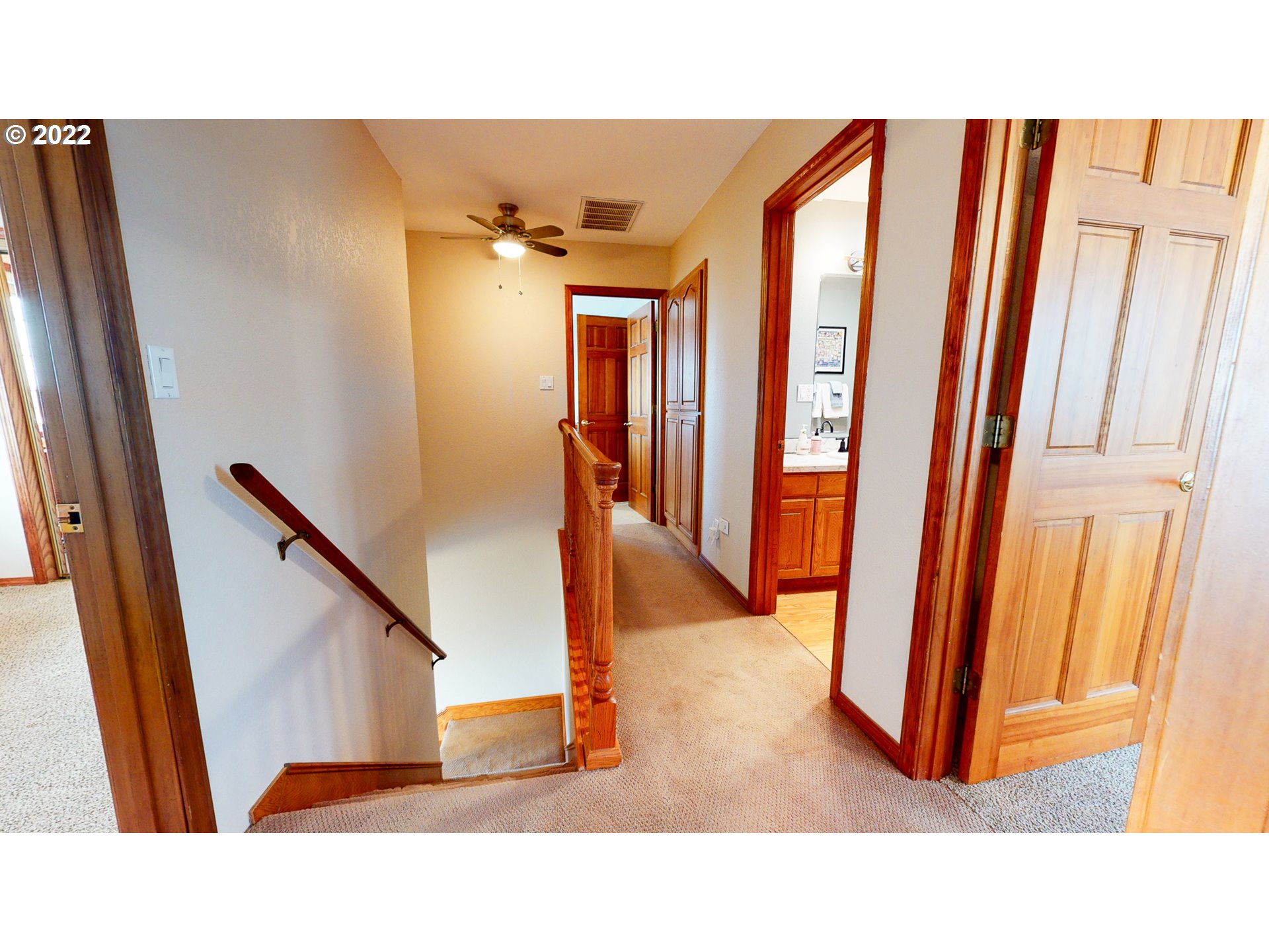 32902 Baxter Road Hermiston, OR 97838 - Photo 15 of 30 a hallway with windows and stairs