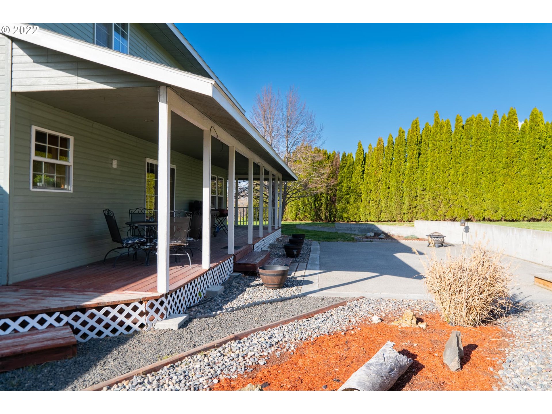 32902 Baxter Road Hermiston, OR 97838 - Photo 22 of 30 a view of swimming pool with an outdoor seating