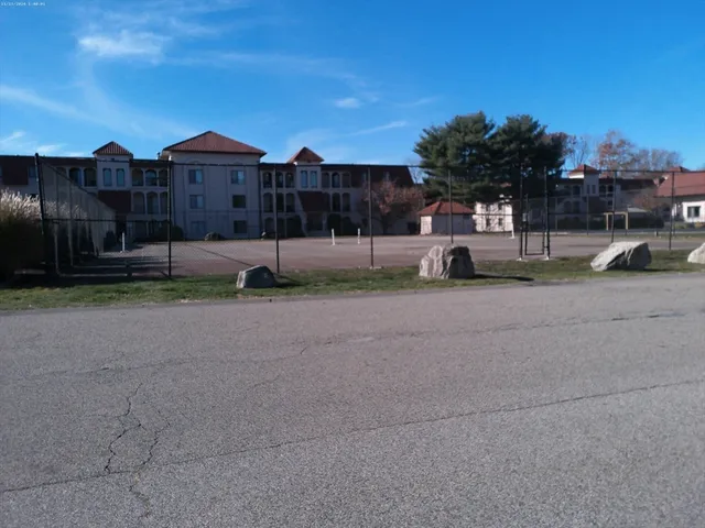 a view of a street with houses