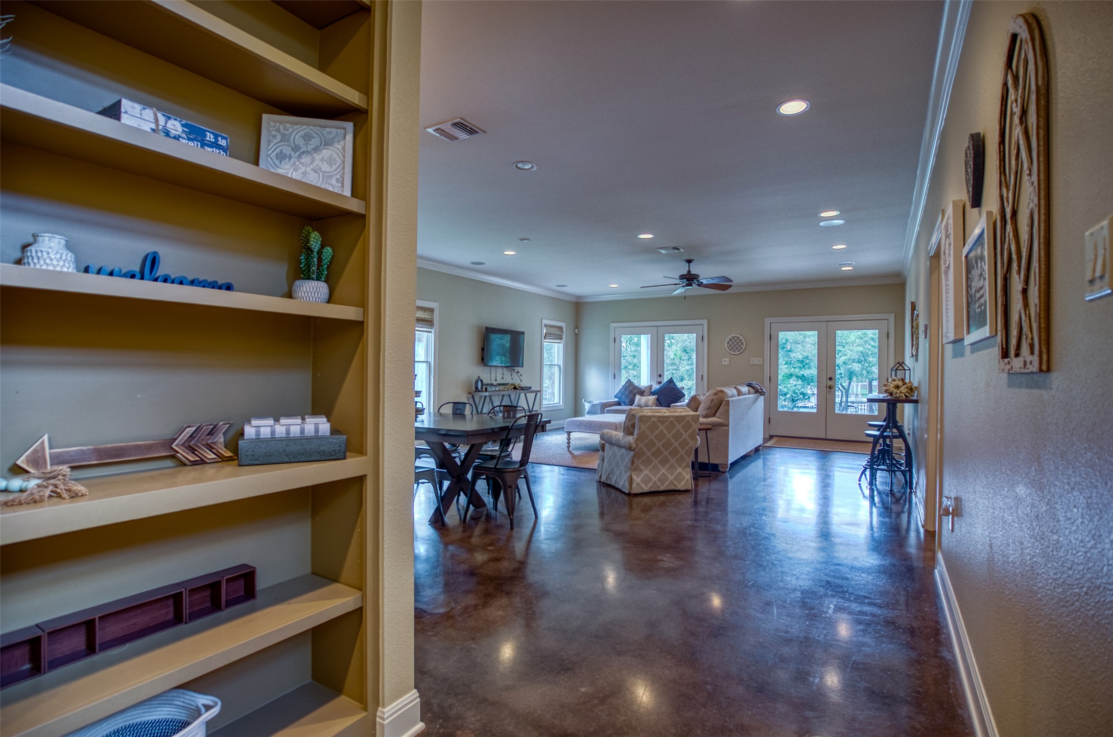 1035 Timber Elm Seguin, TX 78155 - Photo 13 of 35 Built in bookshelves between kitchen and living areas