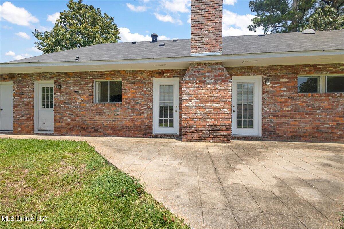 5807 South Pear Orchard Road Jackson, MS 39211 - Photo 22 of 26 22-HTP250816YY7GE-RearPatioArea-PHOTO-2