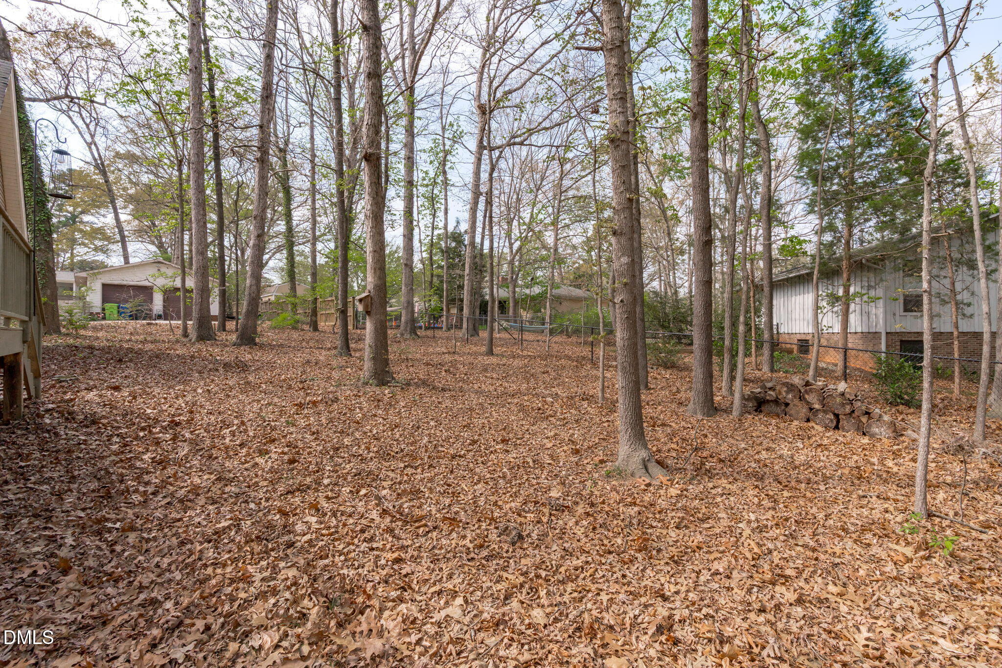 3304 Wade Avenue Raleigh, NC 27607 - Photo 34 of 38 a backyard of a house with lots of green space