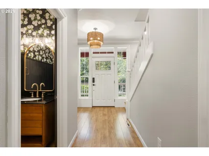 a view of entryway with wooden floor