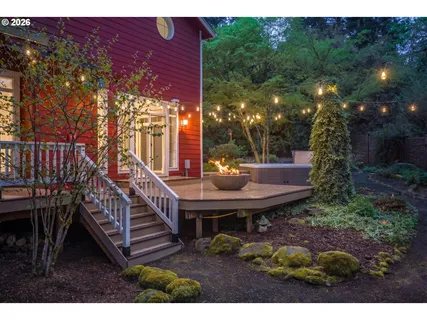 a view of a deck with a table and chairs