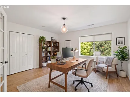 a workspace with furniture and window