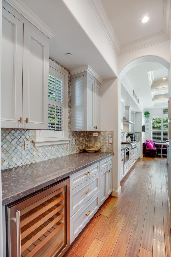 2446 Cherry Avenue San Jose, CA 95125 - Photo 17 of 49 a kitchen with granite countertop a sink cabinets stainless steel appliances and a window