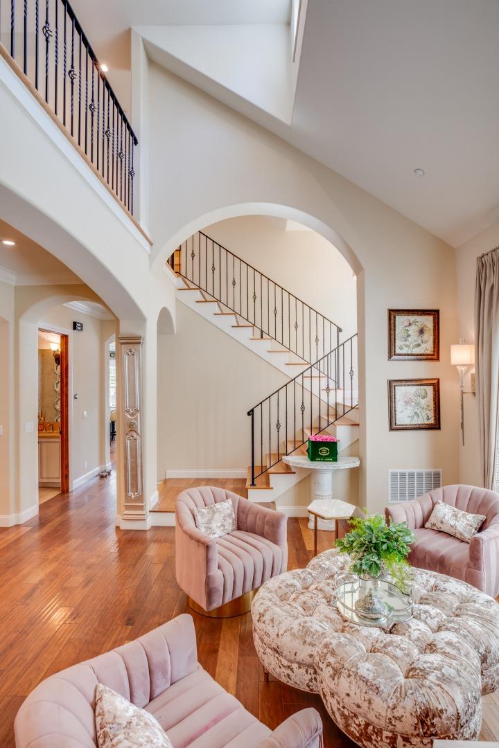 2446 Cherry Avenue San Jose, CA 95125 - Photo 10 of 49 a living room with couches and a dining table with wooden floor