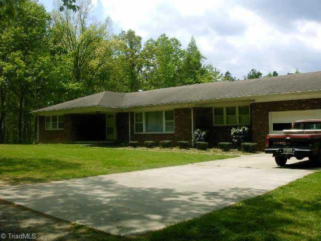 5364 Amick Road Julian, NC 27283 - Photo 1 of 9 Exterior Front. Well maintained brick ranch in SE county on 5+ acres!