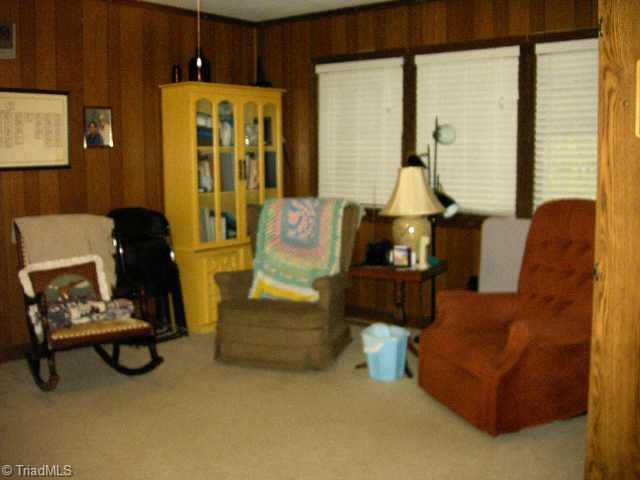 5364 Amick Road Julian, NC 27283 - Photo 5 of 9 Other. Den/office-remove the cabinets in between LR/Den and it s an awesome area for entertaining!