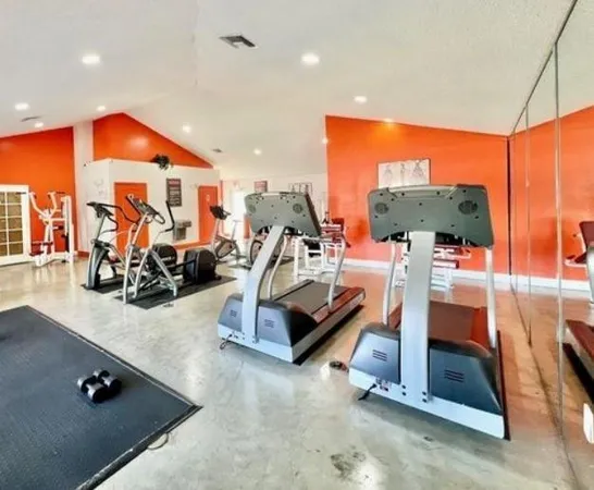 a view of a room with gym equipment