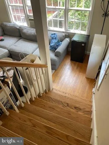 a kitchen with a table and chairs