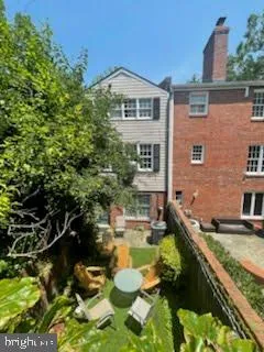 a view of a house with swimming pool