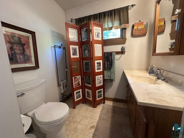 2734 Bear Island River Road Ely, MN 55731 - Photo 30 of 37 Bathroom featuring vanity and toilet