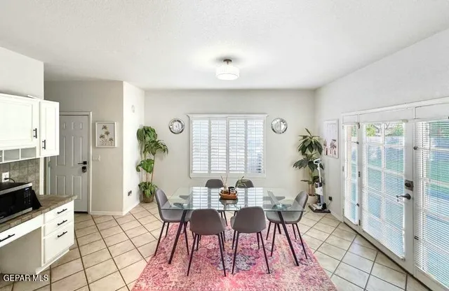 a view of a workspace with furniture