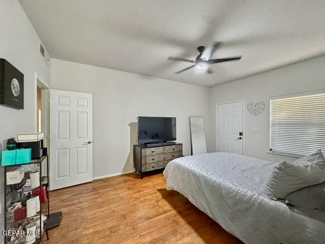 a bathroom with a sink double vanity and a shower
