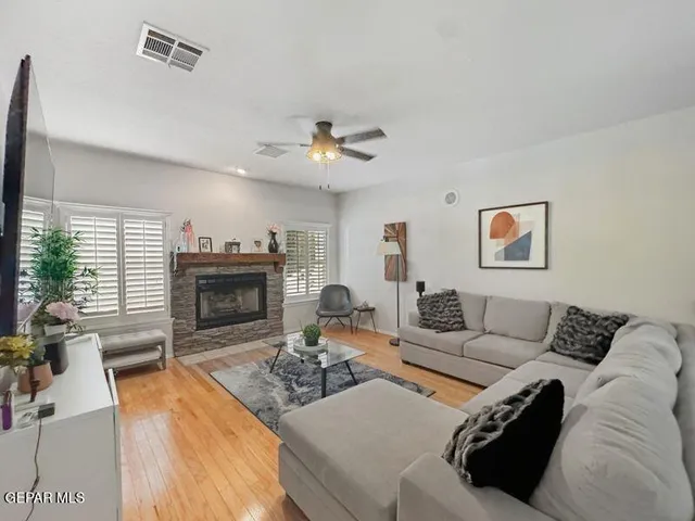 a kitchen with stainless steel appliances granite countertop a stove sink and cabinets