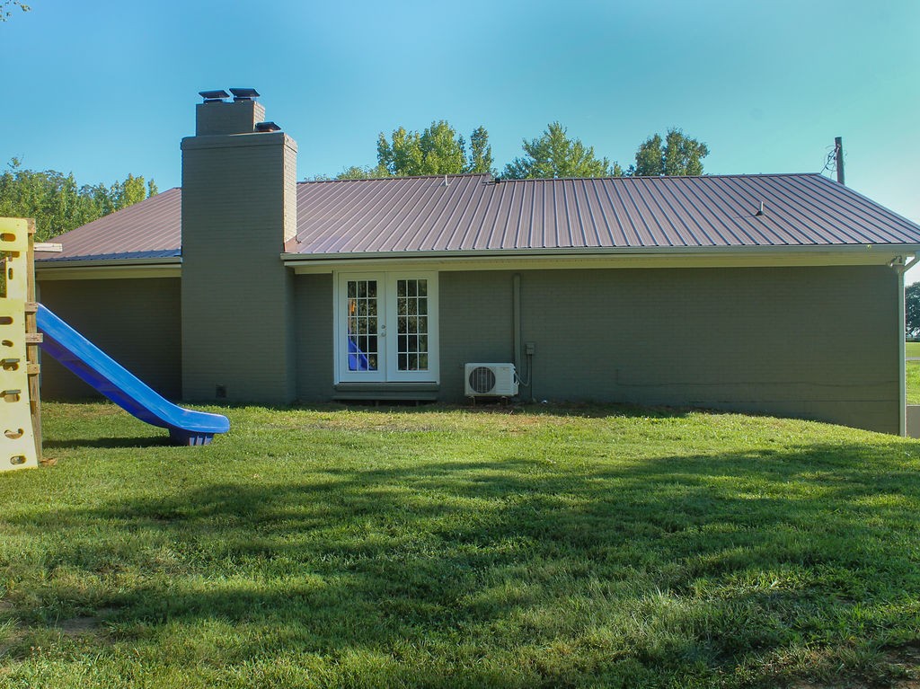 288 Clubbs Road Portland, TN 37148 - Photo 2 of 48 a backyard of a house with table and chairs