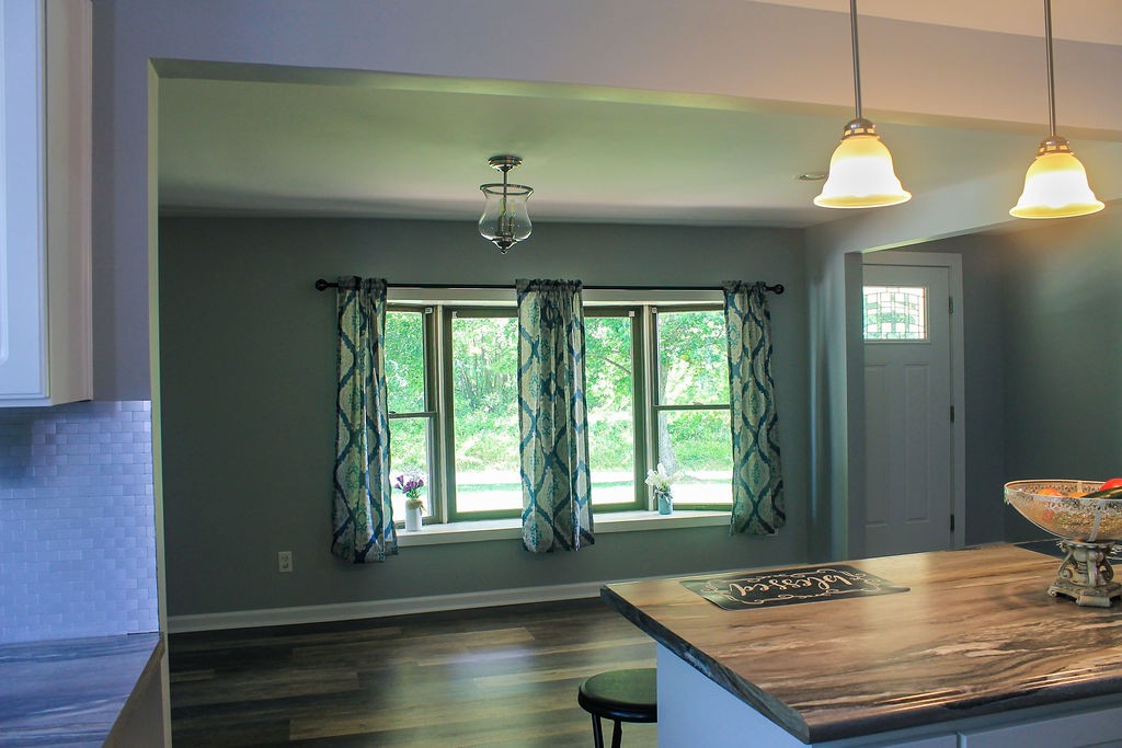 288 Clubbs Road Portland, TN 37148 - Photo 21 of 48 a view of a room that has a bed and a chandelier