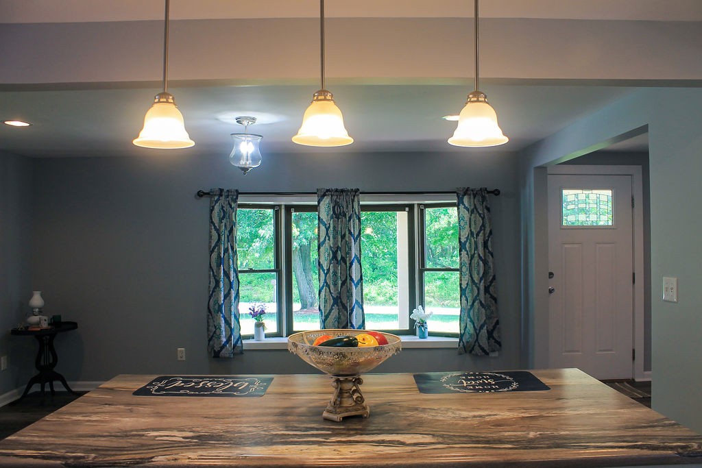 288 Clubbs Road Portland, TN 37148 - Photo 23 of 48 a view of a room with a window and chandelier
