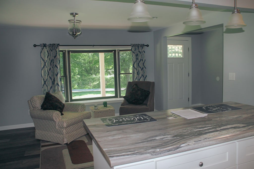 288 Clubbs Road Portland, TN 37148 - Photo 26 of 48 a living room with furniture and a fireplace