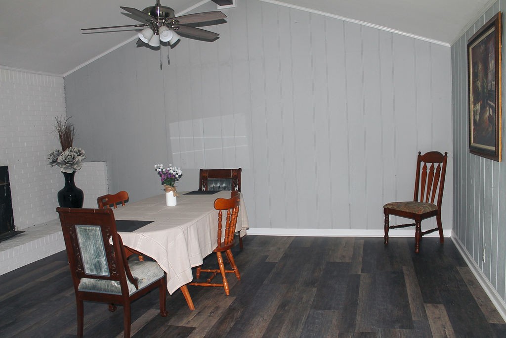 288 Clubbs Road Portland, TN 37148 - Photo 27 of 48 a view of a dining room with furniture and wooden floor