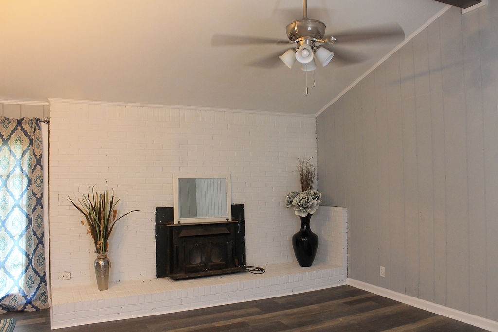 288 Clubbs Road Portland, TN 37148 - Photo 29 of 48 a room with chandelier fan and wooden floor