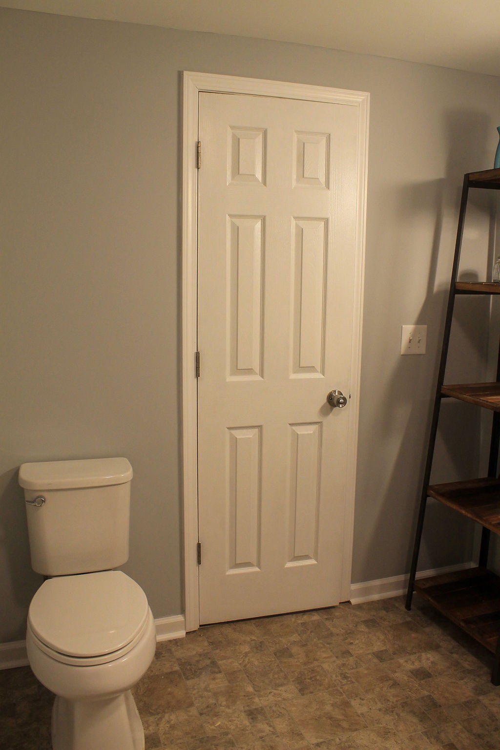 288 Clubbs Road Portland, TN 37148 - Photo 40 of 48 a white toilet sitting next to a sink