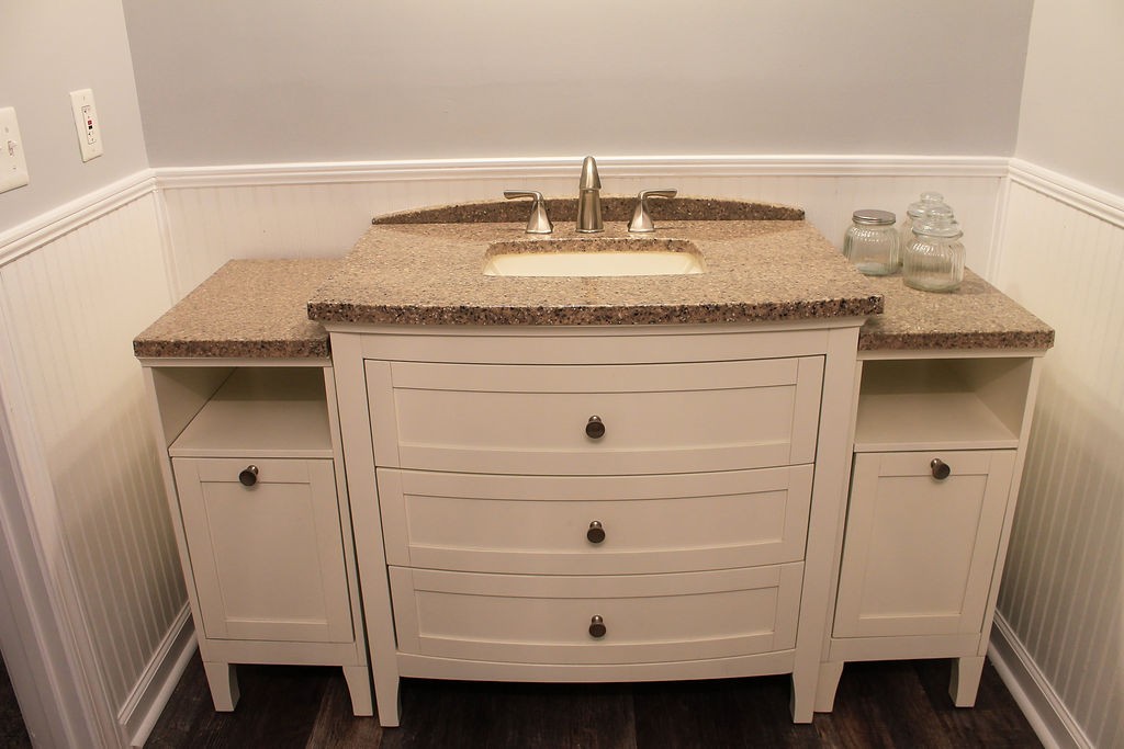 288 Clubbs Road Portland, TN 37148 - Photo 45 of 48 a bathroom with a granite countertop sink and a mirror