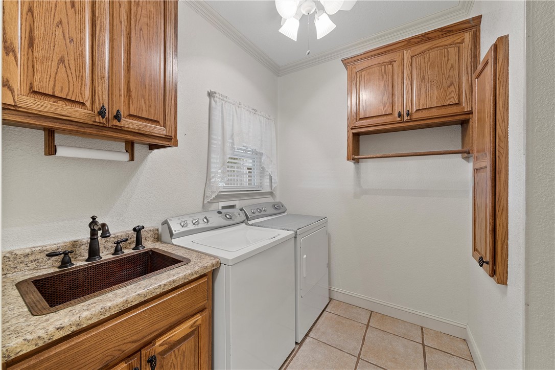 113 Cr 453 Road Troy, TX 76579 - Photo 14 of 41 a kitchen with stainless steel appliances granite countertop a sink and cabinets
