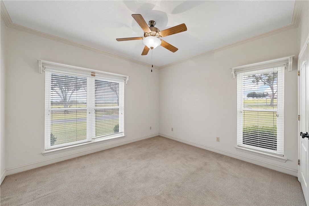 113 Cr 453 Road Troy, TX 76579 - Photo 25 of 41 an empty room with ceiling fan and windows