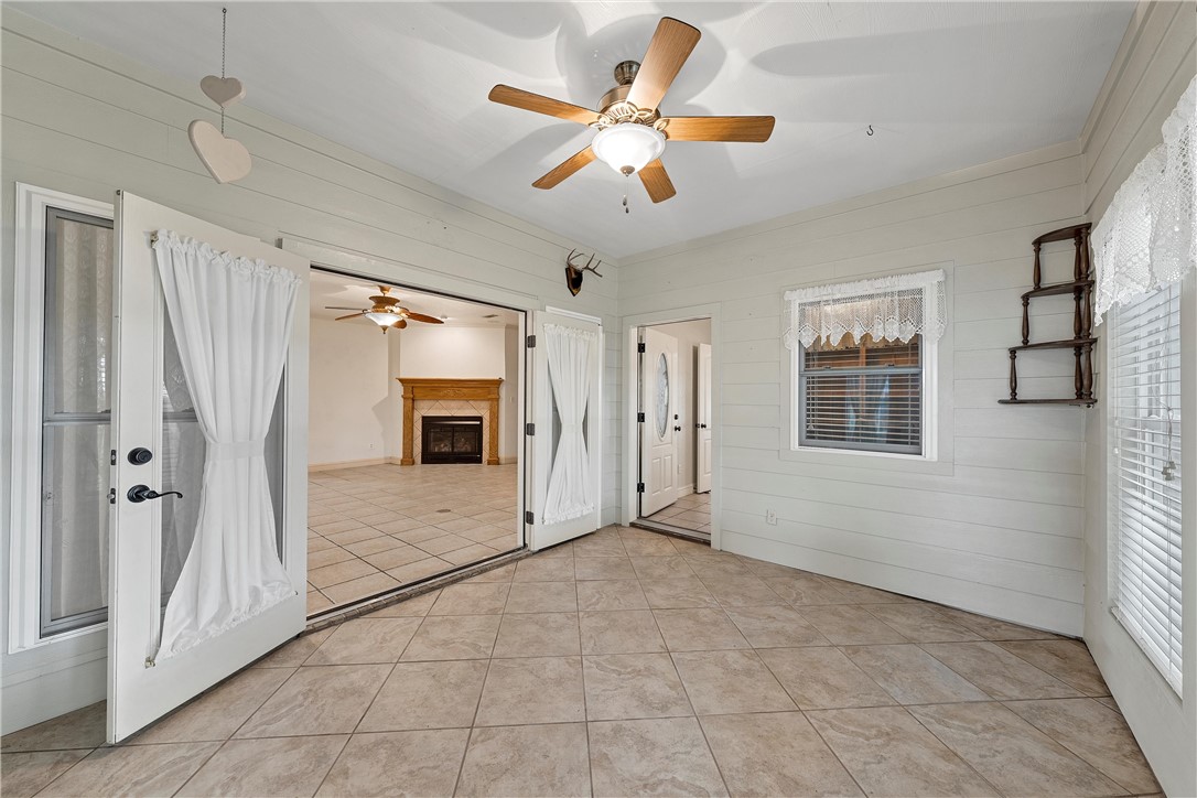 113 Cr 453 Road Troy, TX 76579 - Photo 28 of 41 a view of an empty room with a fireplace and a window