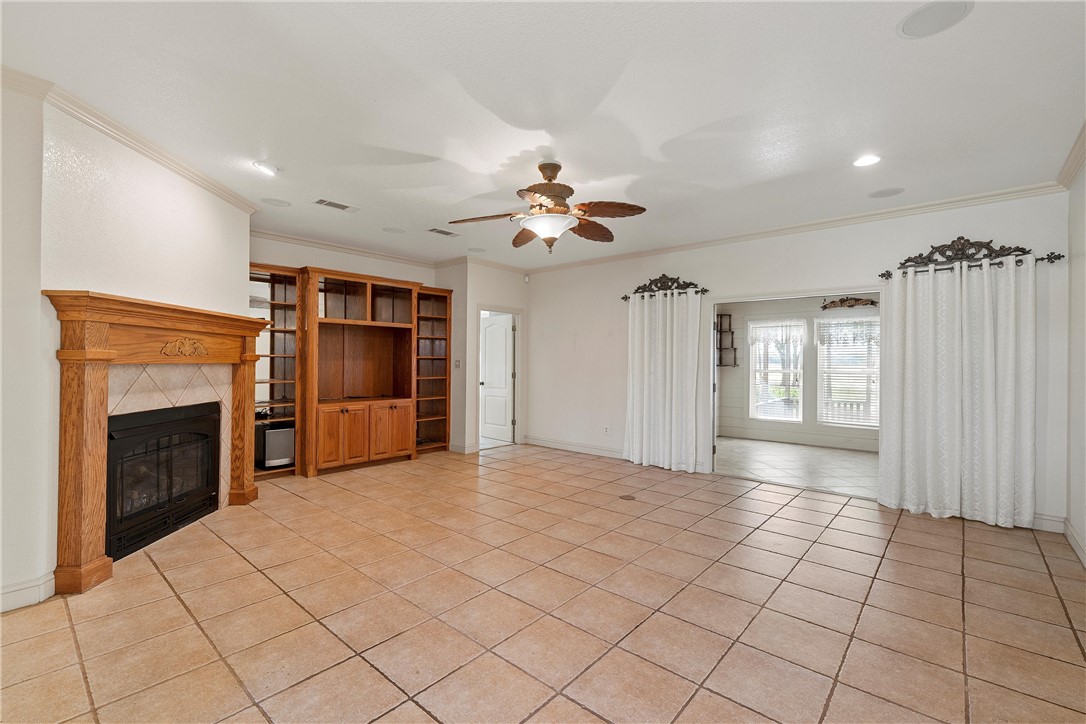 113 Cr 453 Road Troy, TX 76579 - Photo 4 of 41 a view of an empty room with a fireplace