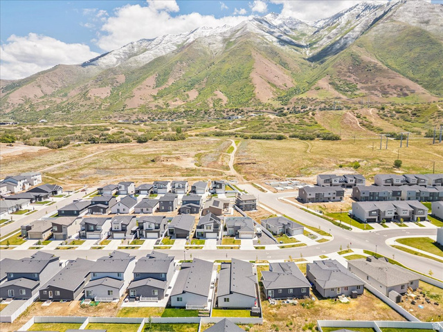 3916 South Sage Wood Avenue Mapleton, UT 84664 - Photo 33 of 33 New construction residential development featuring a mountain backdrop with snow-capped peaks