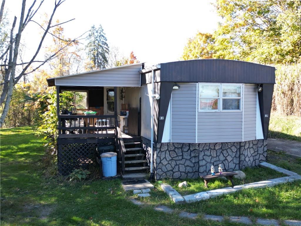 60 Carl Avenue, Unit 2 Eighty Four, PA 15330 - Photo 3 of 15 a view of a house with backyard porch and garden