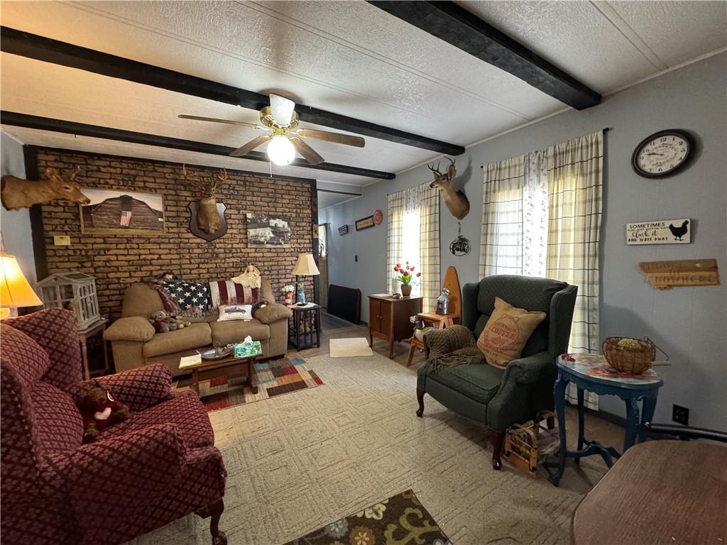 60 Carl Avenue, Unit 2 Eighty Four, PA 15330 - Photo 6 of 15 a living room with patio furniture and a window