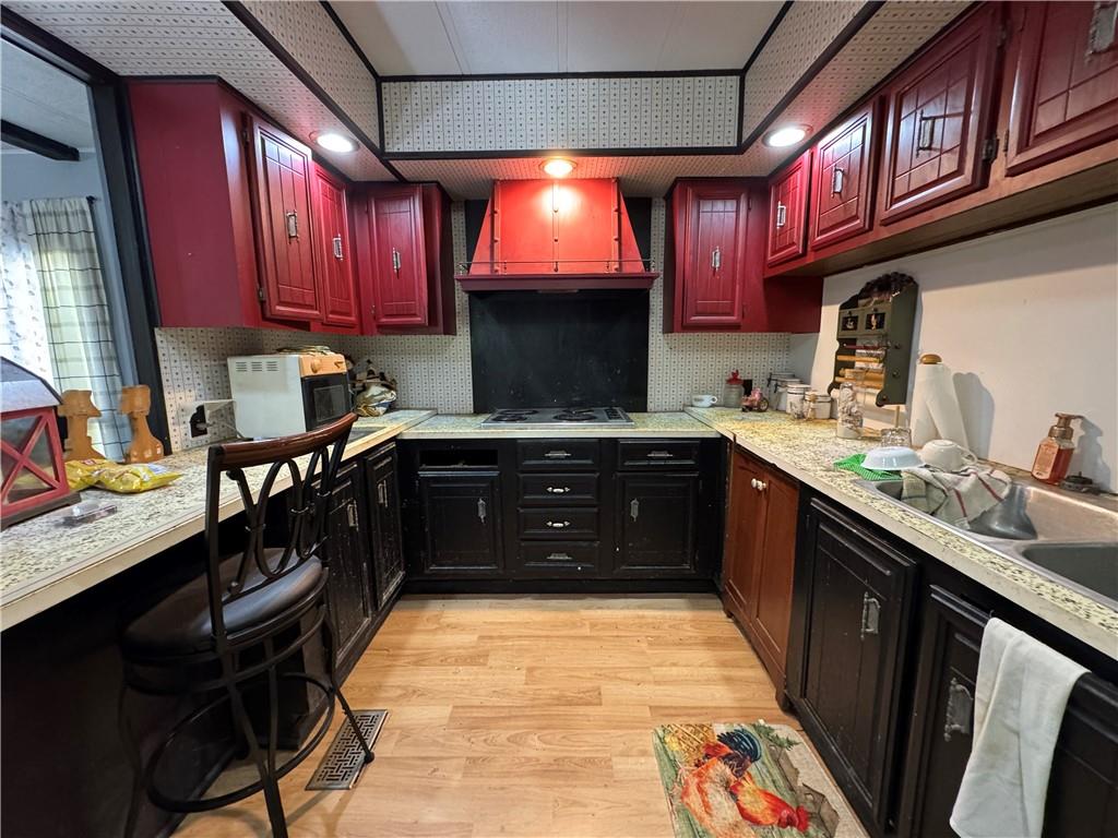 60 Carl Avenue, Unit 2 Eighty Four, PA 15330 - Photo 8 of 15 a kitchen with a sink appliances and cabinets