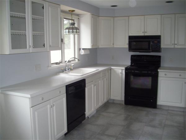 31 Bear Hole Road West Springfield, MA 01089 - Photo 3 of 14 a kitchen with a sink stove and microwave
