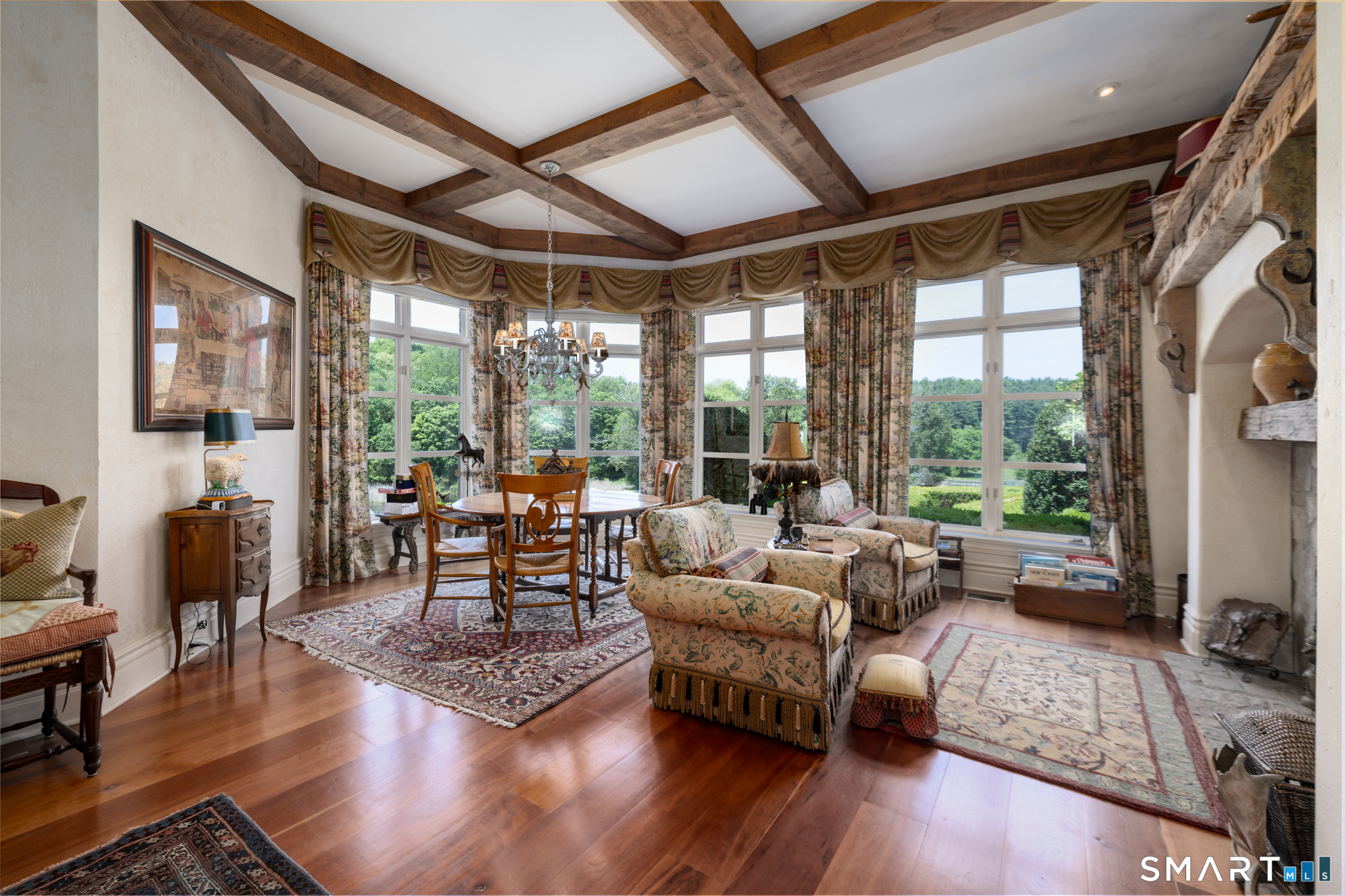 7 Equestrian Ridge Newtown, CT 06470 - Photo 12 of 40 a living room with furniture and a large window