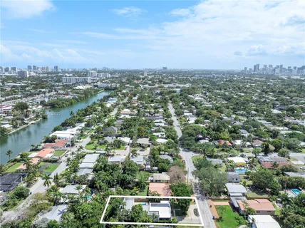 an aerial view of a city with lots of residential buildings