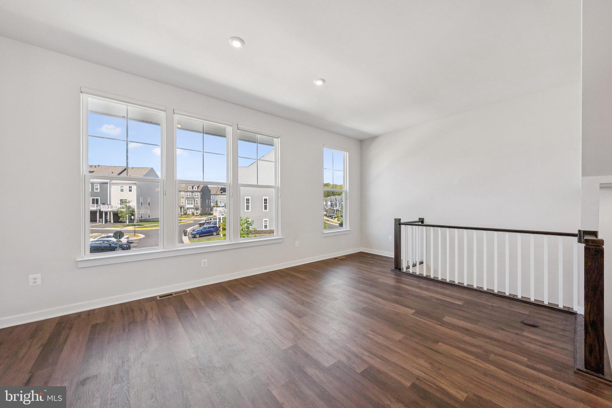 1655 Aspen Poplar Road Dumfries, VA 22026 - Photo 18 of 57 a view of livingroom with furniture wooden floor and window