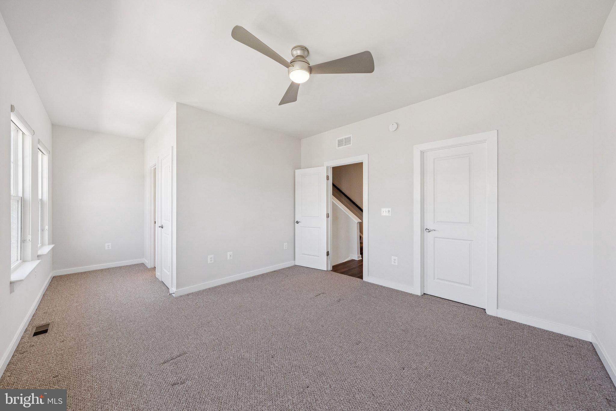1655 Aspen Poplar Road Dumfries, VA 22026 - Photo 24 of 57 an empty room with ceiling fan and entryway