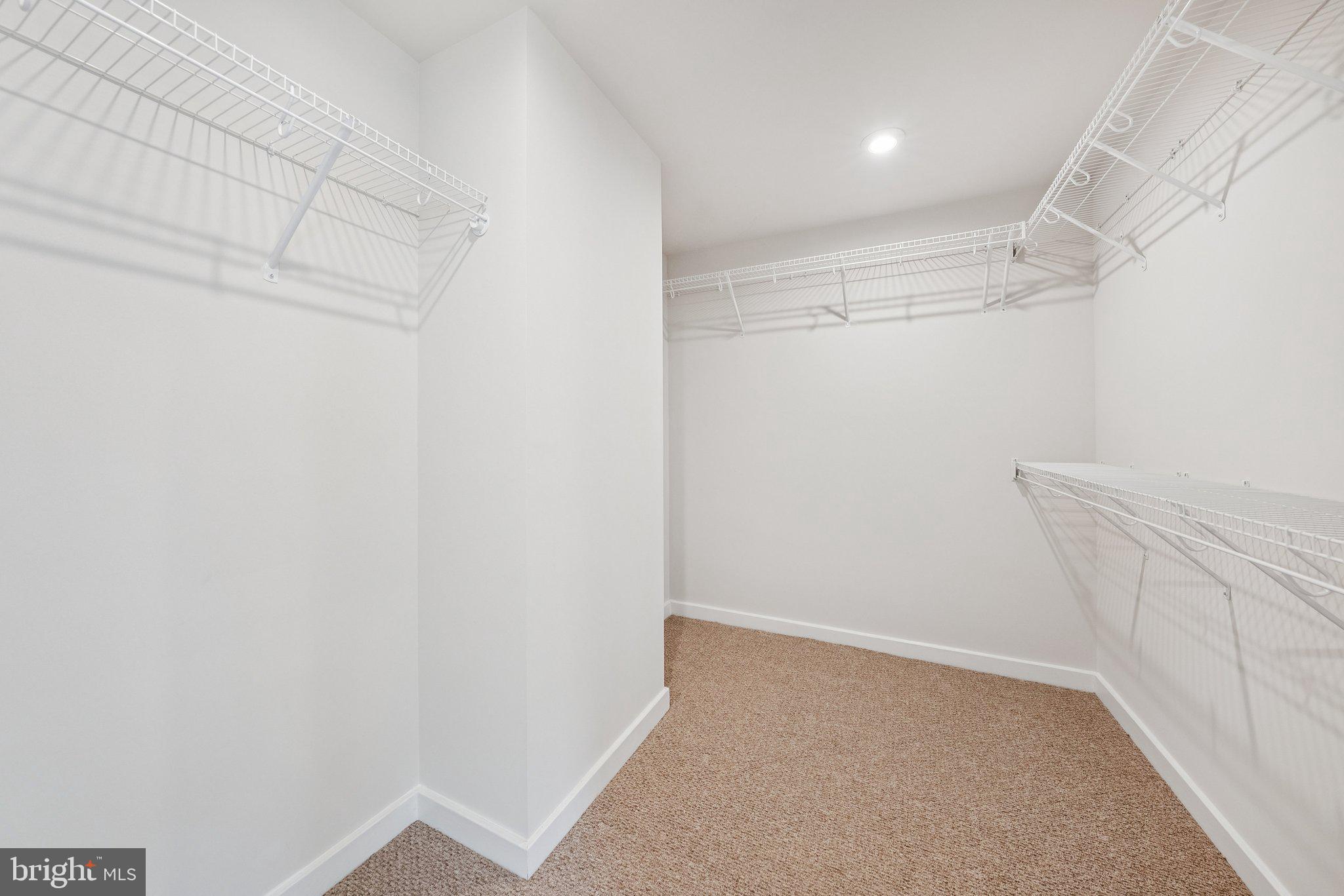 1655 Aspen Poplar Road Dumfries, VA 22026 - Photo 29 of 57 a view of a room with racks on the wall
