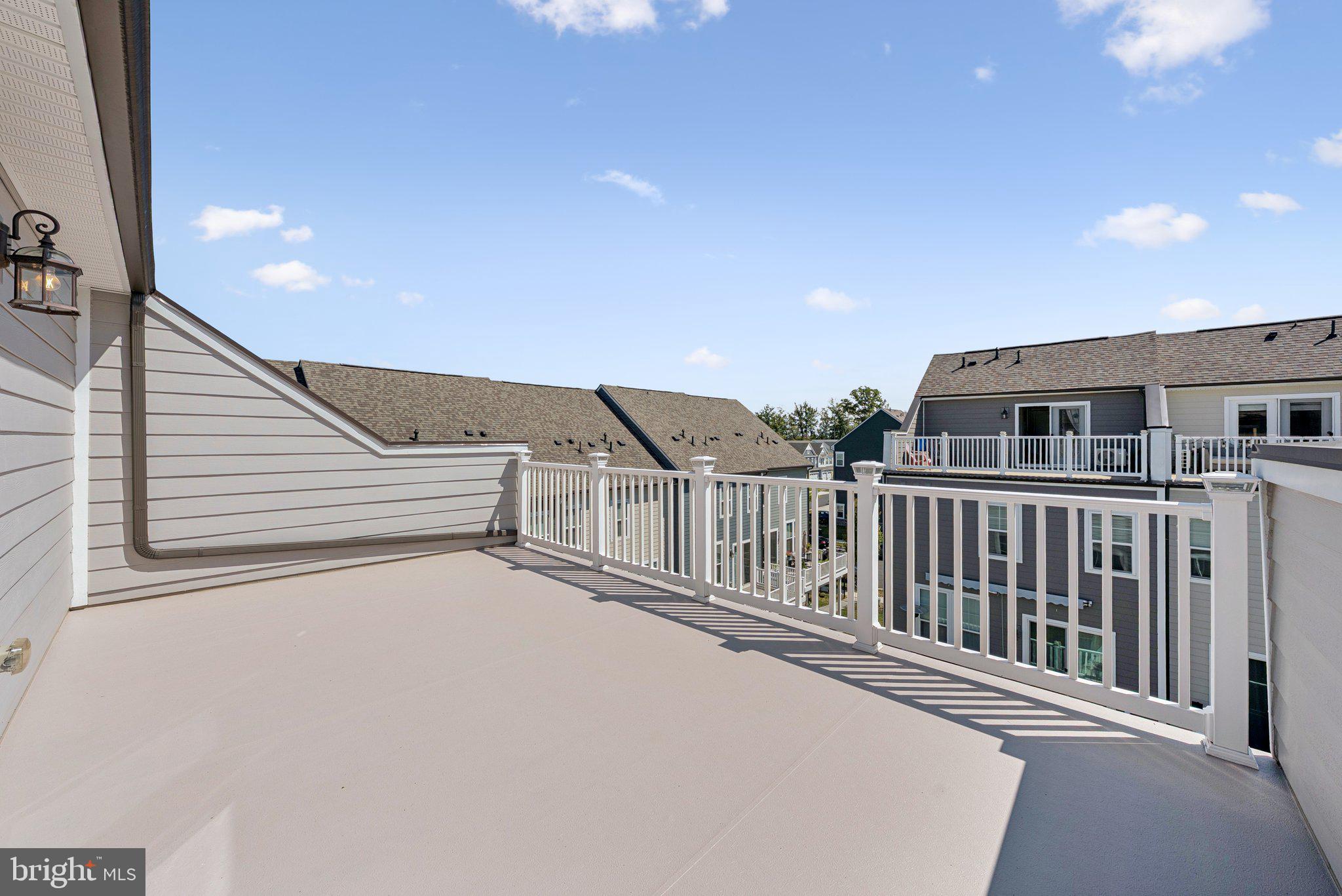 1655 Aspen Poplar Road Dumfries, VA 22026 - Photo 37 of 57 a view of balcony with floor to ceiling window and stairs
